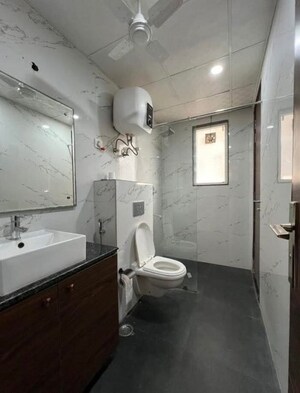 Bathroom in Studio Apartment at DLF Cyber SEZ, Sector 24 – for Rent