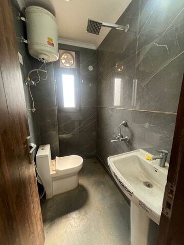 Bathroom in 2 BHK Builder Floor at Rajpur Khurd Extension – for Rent