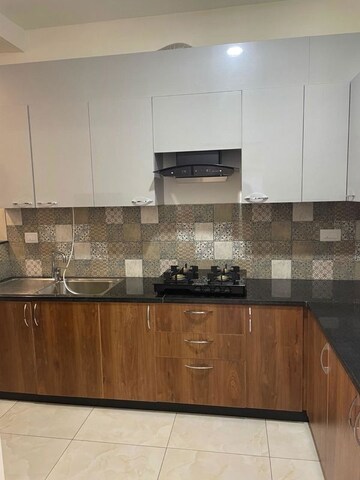 Kitchen in 2 BHK Apartment at Brigade Buena Vista, Budigere – for Rent