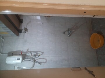 Bathroom in 2 BHK Builder Floor at Pooja Alka Uttam Enclave, Mundhwa – for Rent