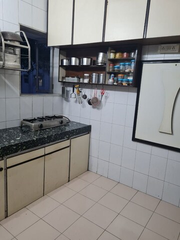 Kitchen in 1 BHK Apartment at Jewellers Apartment, Cumbala Hill – for Sale