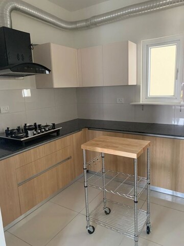 Kitchen in 3 BHK Apartment at Godrej Aqua, International Airport Road – for Rent