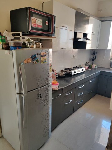 Kitchen in 1.5 BHK Apartment at Signature Global Synera, Sector 81 – for Rent