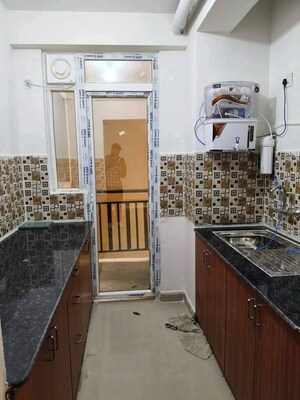 Kitchen in 2.5 BHK Apartment at JNC The Park, Sector 16c Greater Noida – for Rent