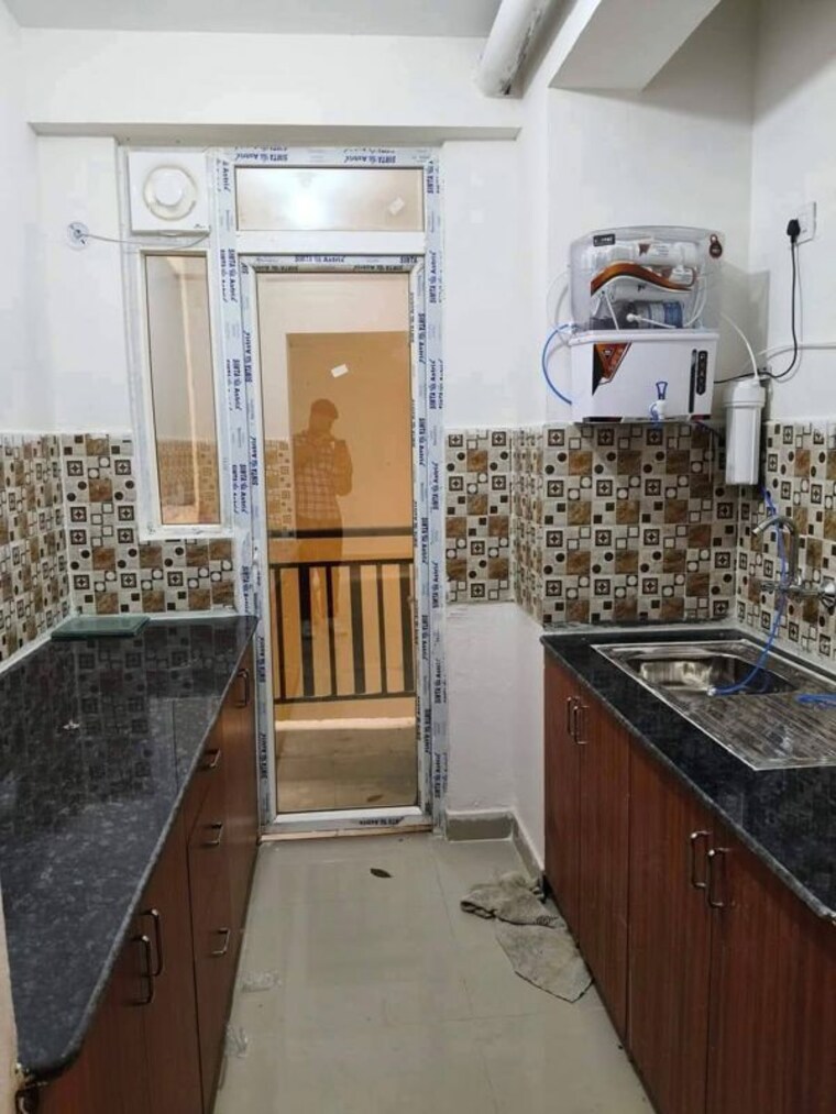 Kitchen, jnc-the-park 2.5 Bedroom 1250 Sq.Ft. Apartment In Sector 16c Greater Noida Greater Noida 10057407