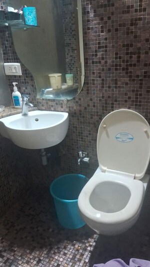 Bathroom in 2 BHK Apartment at DLH New Chandra CHS, Andheri West – for Sale