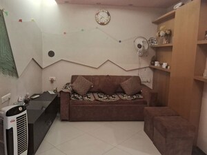 Living Room in 2 BHK Apartment at DLH New Chandra CHS, Andheri West – for Sale