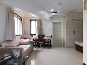 Living Room in Studio Apartment at Shastri Hall, Grant Road – for Sale
