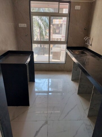 Kitchen in 2 BHK Apartment at DGS Sheetal Meghdoot, Borivali West – for Sale