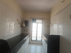 Kitchen in 1 BHK Apartment at Prithvi Regency, Tembhode – for Rent