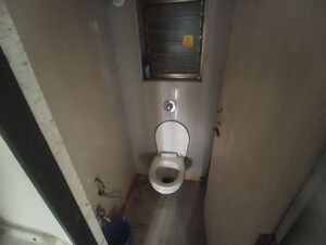 Bathroom in 1 BHK Apartment at Unicorn Global Arena, Naigaon East – for Sale