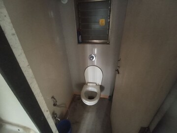 Bathroom in 1 BHK Apartment at Unicorn Global Arena, Naigaon East – for Sale