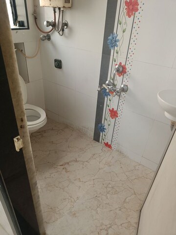 Bathroom in 2 BHK Apartment at Giriraj Apartment, Kandivali West – for Rent