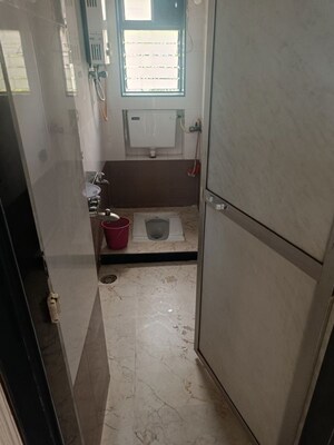 Bathroom in 2 BHK Apartment at Giriraj Apartment, Kandivali West – for Rent
