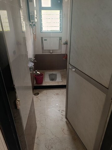 Bathroom in 2 BHK Apartment at Giriraj Apartment, Kandivali West – for Rent