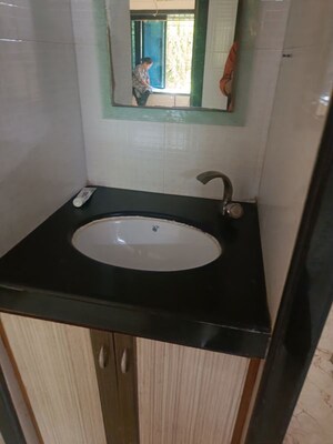 Bathroom in 2 BHK Apartment at Giriraj Apartment, Kandivali West – for Rent