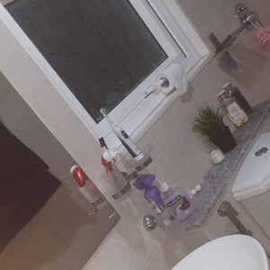 Bathroom in 2 BHK Apartment at Bhartiya Nikoo Homes Phase 2, Kannur – for Rent