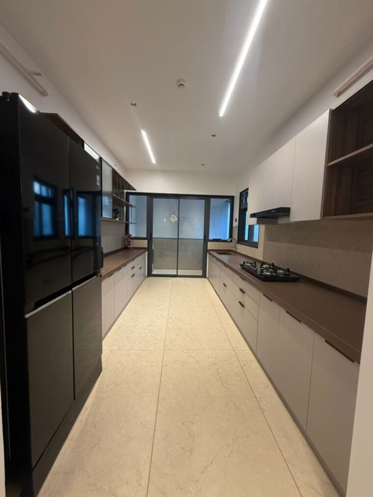 Kitchen, unique-envogue 4 Bedroom 1935 Sq.Ft. Apartment In Mundhwa Pune 10058071