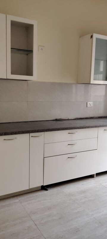 Kitchen in 3.5 BHK Builder Floor at Puri Aman Vilas, Sector 89 – for Sale