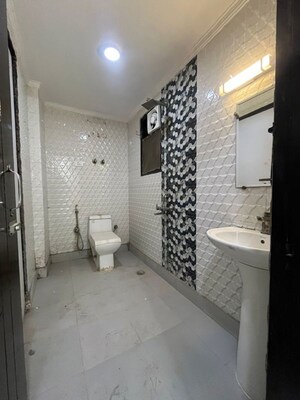 Bathroom in 3 BHK Builder Floor at Hargobind Enclave – for Rent