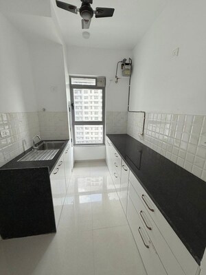 Kitchen in 1 BHK Apartment at Kalpataru Immensa, Kolshet Road – for Rent