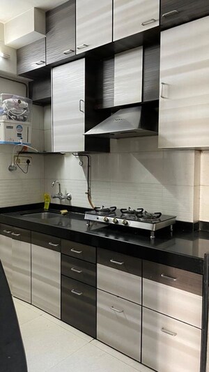 Kitchen in 3 BHK Apartment at Hiranandani Meadows, Manpada – for Rent