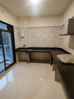 Kitchen in 3 BHK Apartment at Paradise Sai Aaradhya, Kharghar Sector 35i – for Rent