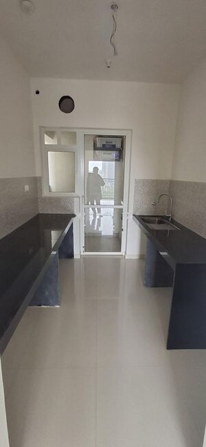 Kitchen in 2 BHK Apartment at Godrej Nurture Pune, Mamurdi – for Sale
