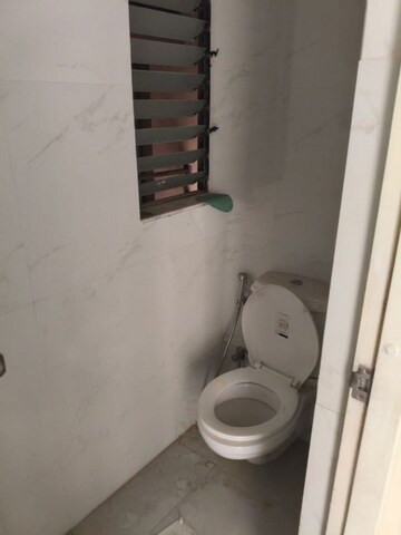 Bathroom in 1 BHK Apartment at Runwal Gardens Phase I, Dombivli East – for Rent