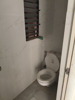 Bathroom in 1 BHK Apartment at Runwal Gardens Phase I, Dombivli East – for Rent