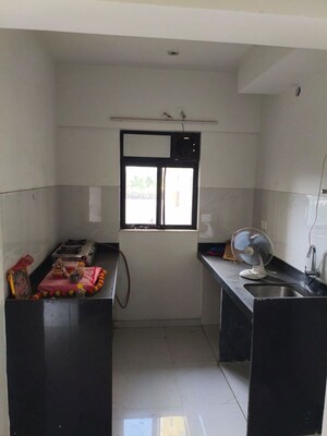 Kitchen in 1 BHK Apartment at Runwal Gardens Phase I, Dombivli East – for Rent