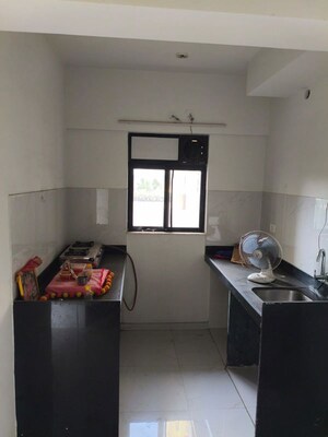 Kitchen in 1 BHK Apartment at Runwal Gardens Phase I, Dombivli East – for Rent