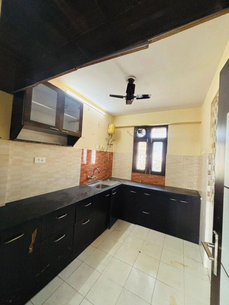Kitchen, rajpur khurd extension 2 Bedroom 90 Sq.Yd. Builder Floor In Rajpur Khurd Extension Delhi 10058408