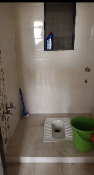Bathroom in 2 BHK Apartment at Om Shiv Chaya CHS, Dombivli West – for Rent