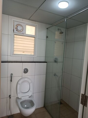 Bathroom in 3 BHK Apartment at Godrej Aqua, International Airport Road – for Rent