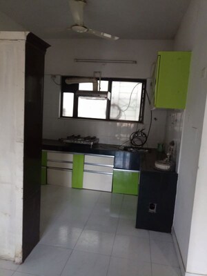 Kitchen in 2 BHK Apartment at Muridhar Kunj Apartment, Kothrud – for Rent
