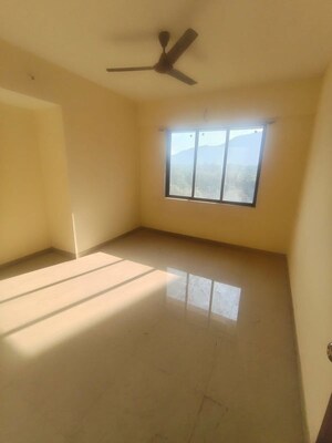 Bedroom in 2 BHK Apartment at Pushpanjali Heights, Owale – for Rent