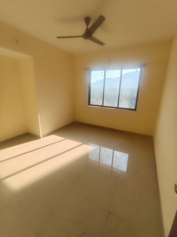 Bedroom in 2 BHK Apartment at Pushpanjali Heights, Owale – for Rent