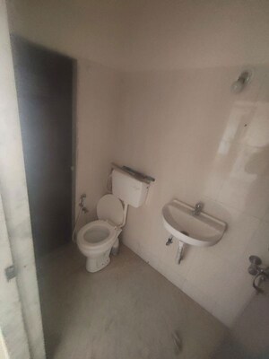 Bathroom in 2 BHK Apartment at Pushpanjali Heights, Owale – for Rent