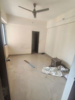 Bedroom in 2 BHK Apartment at Pushpanjali Heights, Owale – for Rent