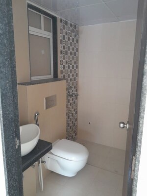 Bathroom in 4 BHK Apartment at SD Siennaa Wing D, Kandivali East – for Sale