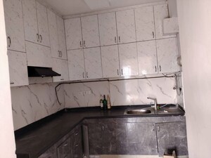 Kitchen in 3 BHK Apartment at Amrapali Golf Homes, Sector 4 Greater Noida – for Rent