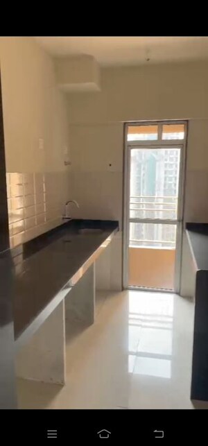 Kitchen in 2 BHK Apartment at JP North, Mira Road – for Rent