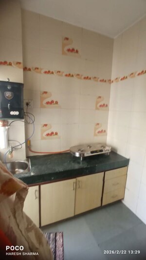 Kitchen in 2 BHK Apartment at Krishna Nagar – for Sale