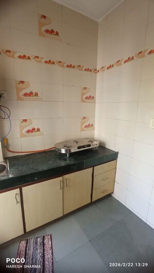 Kitchen in 2 BHK Apartment at Krishna Nagar – for Sale