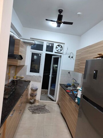 Living Room in 2 BHK Apartment at Casa Woodstock, Sector 16c Greater Noida – for Rent