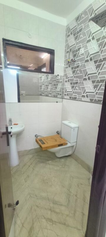 Bathroom in 3 BHK Builder Floor at Rohini Sector 25 – for Sale