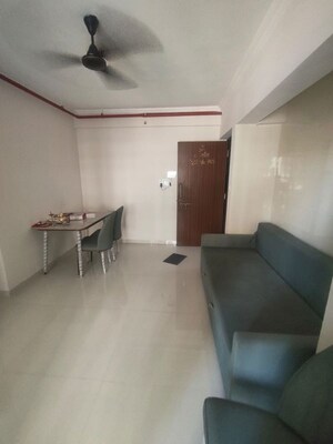 Living Room in 1 BHK Apartment at Raunak Bliss, Ghodbunder Road – for Rent
