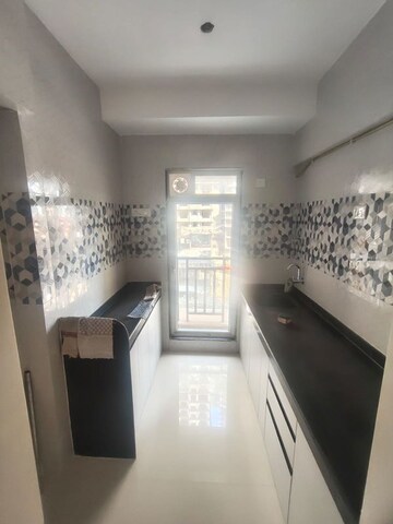 Kitchen in 1 BHK Apartment at Raunak Bliss, Ghodbunder Road – for Rent