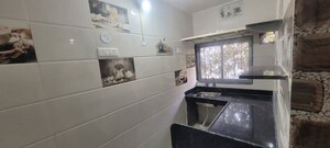 Kitchen in 2 BHK Apartment at Yashodanandan Apartment, Viman Nagar – for Rent